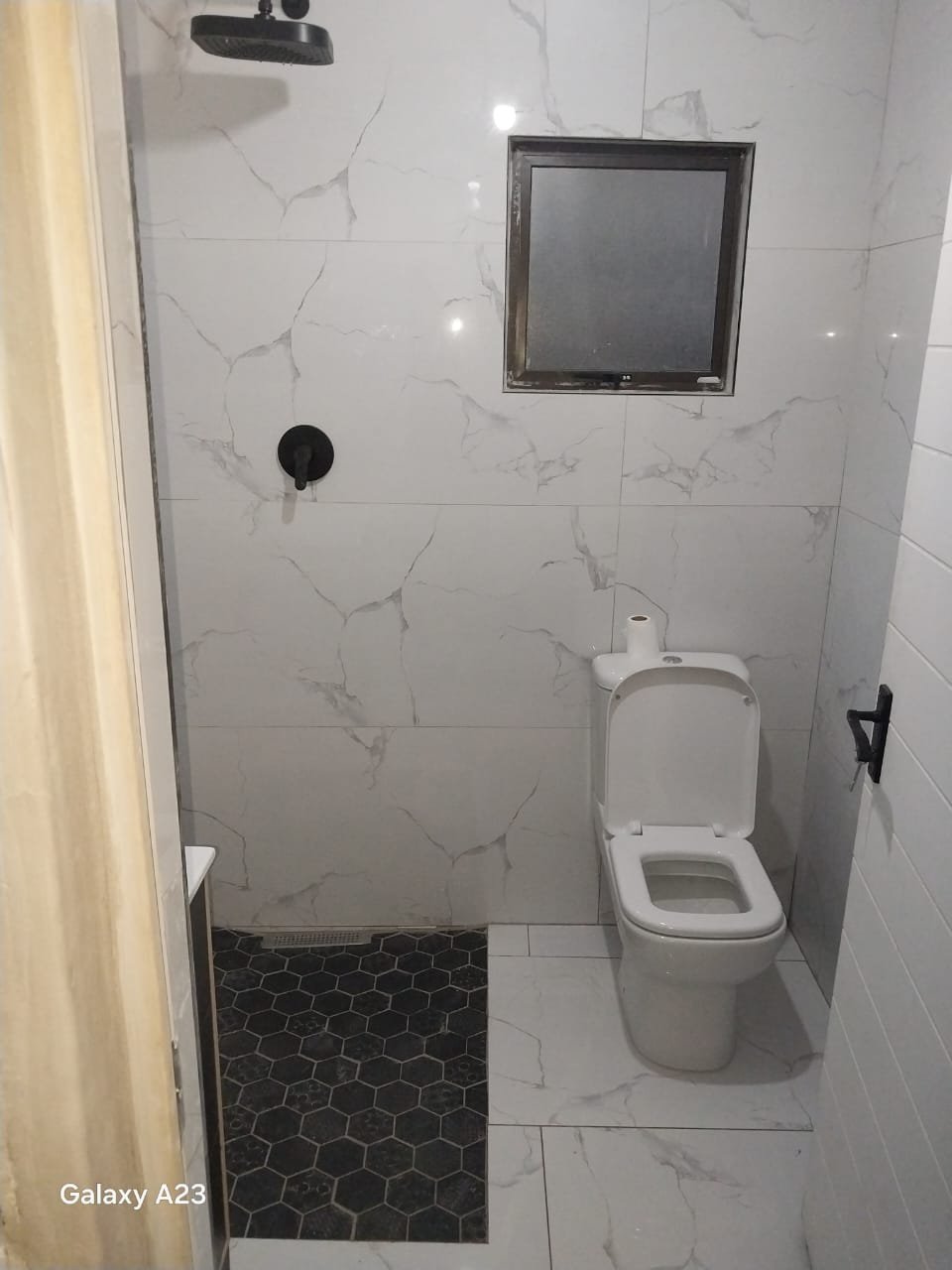 Luxury bathroom tiling by DB Renovate Plus